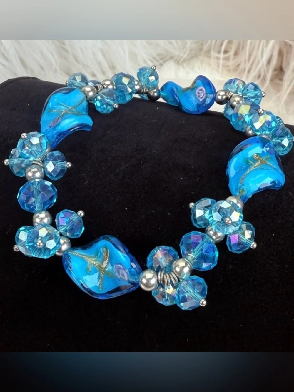 Beautiful reflective blue beaded glass stretch bracelet